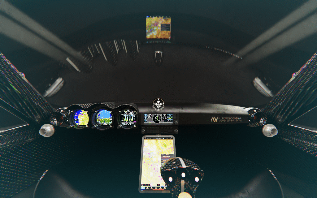 Pilot’s cockpit with multiple flight instruments, a central console, and a smartphone displaying a map screen in the foreground.