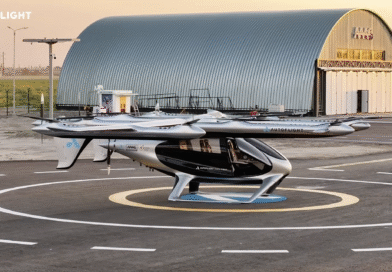 Autoflight logo in the top-left; futuristic aircraft on a circular helipad in front of a curved metal hangar at sunset.