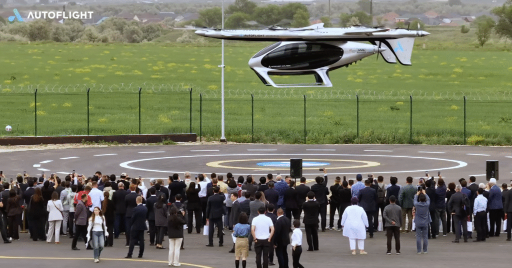 Screenshot 2026-05-21 at 095742 - eVTOL Insights Large crowd at an airfield watches a white VTOL aircraft hovering above a circular helipad, with Autflight branding visible in the background.