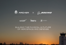 Collaboration banner showing Archer and Boeing logos with partner brands and the slogan 'BUILDING THE PHYSICAL AI FUTURE OF AEROSPACE AND DEFENSE' at sunset near an airport control tower
